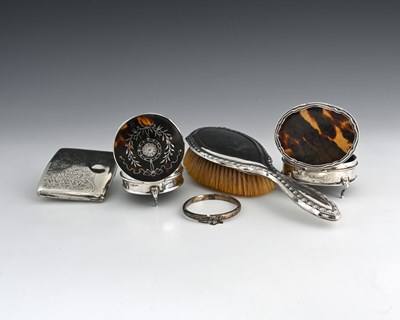 Lot 273 - A George V silver and tortoiseshell jewellery...