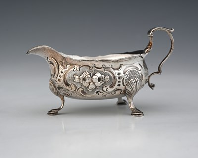 Lot 236 - A George II silver sauce boat, of conventional...