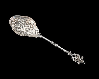 Lot 184 - An Edwardian silver serving spoon, with cast...
