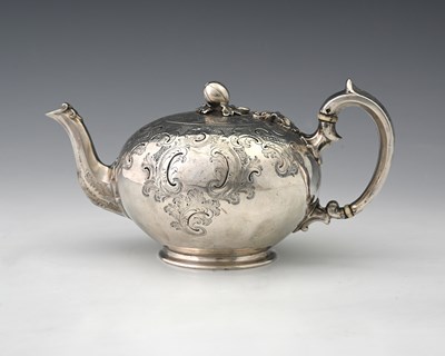 Lot 151 - A Victorian silver teapot, of globular form,...