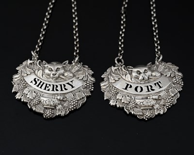 Lot 210 - A pair of George IV silver die-stamped wine...