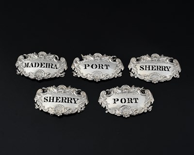 Lot 200 - Five Victorian silver die-stamped wine labels...