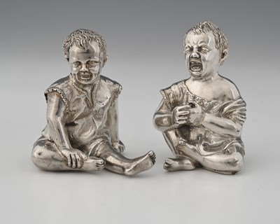 Lot 369 - A pair of Victorian cast silver novelty salt...