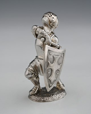 Lot 174 - A Victorian novelty cast silver pepper pot,...