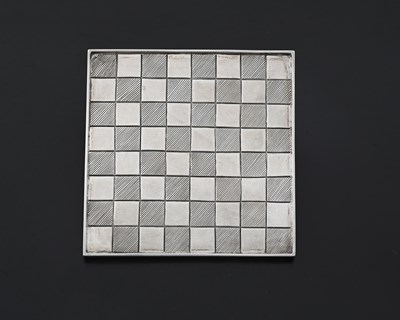 Lot 375 - A George III miniature silver chess board,...