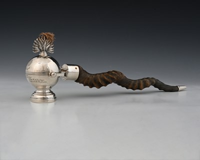 Lot 441 - A Regimental table lighter in the form of a...