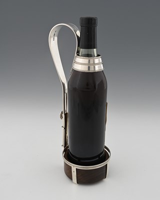 Lot 384 - A Victorian silver adjustable wine bottle...