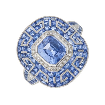 Lot 104 - A platinum cushion-shape sapphire and...