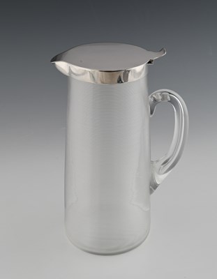 Lot 650 - Hukin and Heath, a silver-mounted lidded...