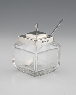 Lot 612 - Hukin and Heath, a silver-mounted glass jam...