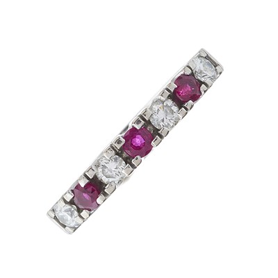 Lot 107 - An 18ct gold alternating circular-shape ruby...