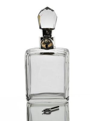 Lot 648 - Hukin and Heath, an Art Deco locking decanter,...