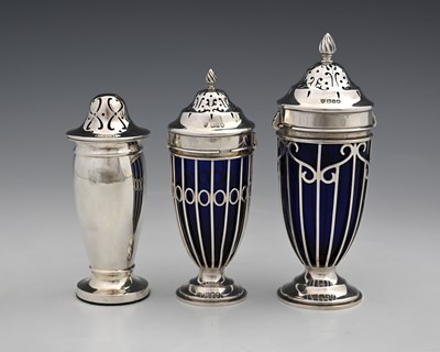 Lot 290 - A George V silver caster, with blue glass...