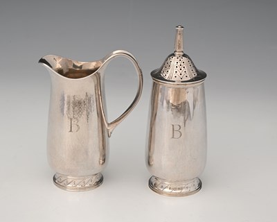 Lot 342 - Brian Cain, a silver caster and cream jug, the...
