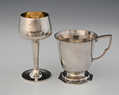 Lot 575 - R. E. Stone, a George V silver mug, in the...