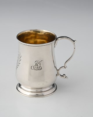 Lot 299 - A George III silver baluster mug, London 1776,...