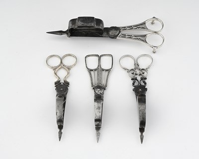 Lot 270 - Four silver and steel scissor snuffers, to...