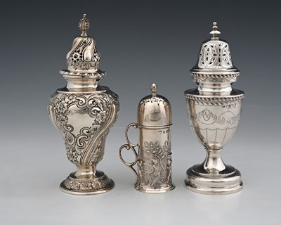 Lot 354 - Three Edwardian silver casters, to include a...