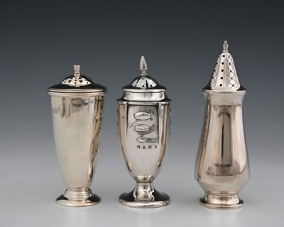 Lot 356 - An Edwardian silver caster, the body decorated...