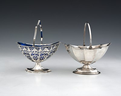 Lot 101 - An Elizabeth II silver navette swing handle...