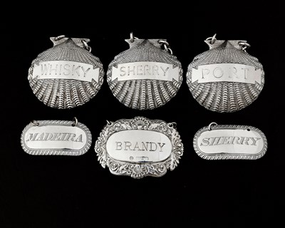 Lot 409 - A group of hallmarked silver wine labels,...