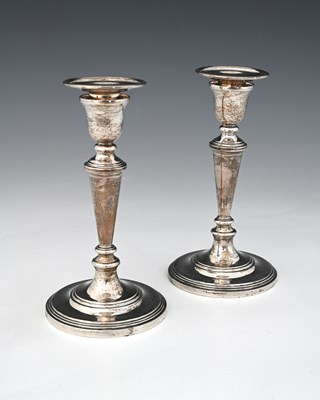 Lot 98 - A pair of Elizabeth II candlesticks with...