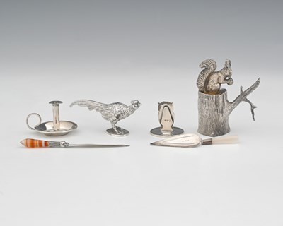 Lot 131 - A George V novelty silver menu holder,...