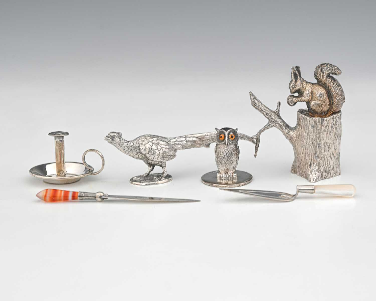Lot 131 - A George V novelty silver menu holder,...