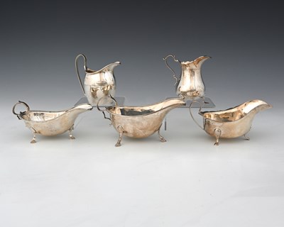 Lot 253 - A late Victorian silver cream jug, in the...
