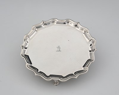 Lot 275 - A George II silver waiter, with shaped scroll...