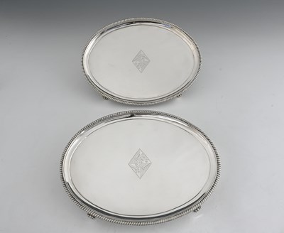 Lot 429 - A pair of George III oval silver salvers,...