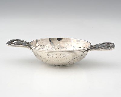 Lot 151 - An American silver tea strainer by Tiffany &...