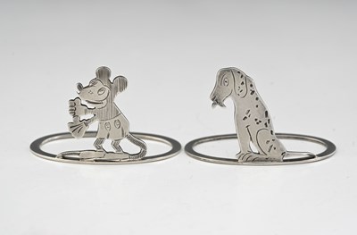 Lot 511 - A pair of George V silver novelty napkin rings,...