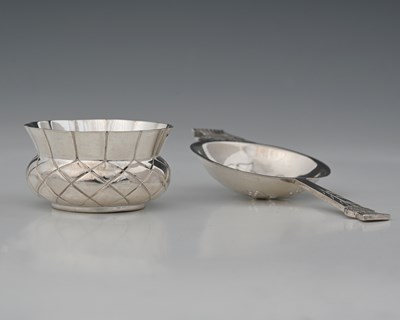 Lot 157 - R.E. Stone, a silver tea strainer and bowl,...