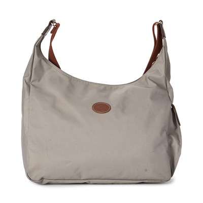 Lot 385 - Longchamp, a large Pliage crossbody hobo handbag.