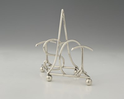 Lot 531 - An Edwardian novelty silver toast rack, the...
