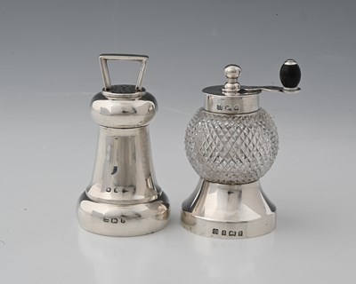 Lot 644 - Hukin and Heath, two silver-mounted pepper...