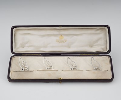 Lot 307 - A cased set of four George V silver menu...