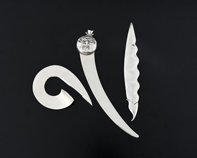 Lot 309 - An American silver moon face letter opener,...