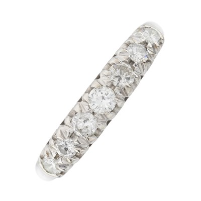 Lot 48 - An 18ct gold diamond half eternity ring