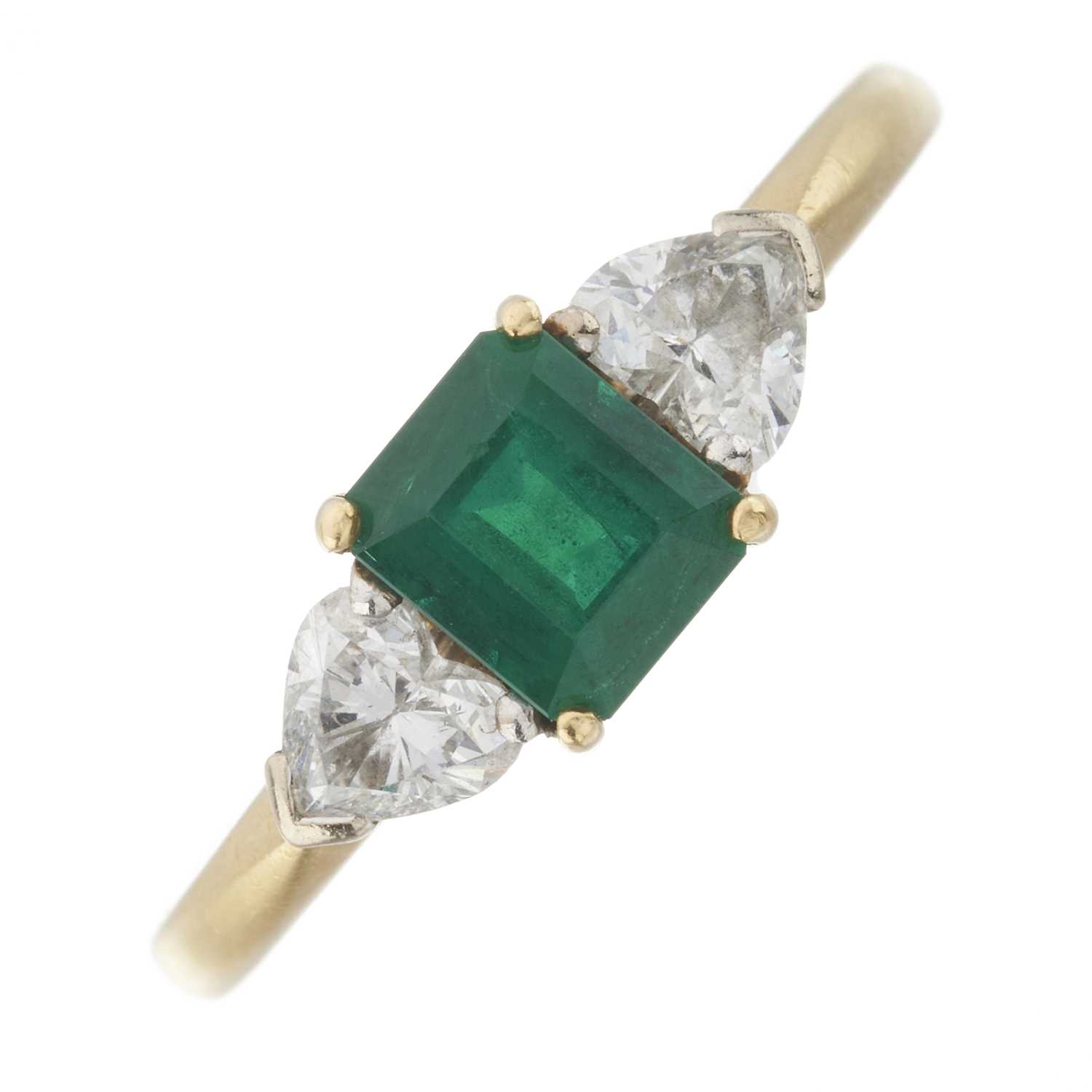 Lot 59 - An 18ct gold emerald and diamond three-stone ring