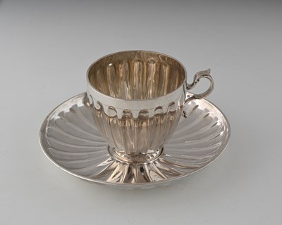 Lot 316 - A Victorian Scottish silver tea cup and saucer,...