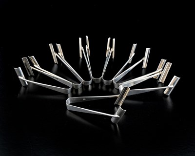 Lot 262 - A set of eight Edwardian silver asparagus...