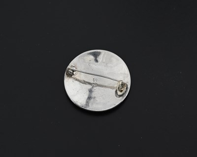 Lot 51 - Shetland Silver, a silver enamel floral brooch