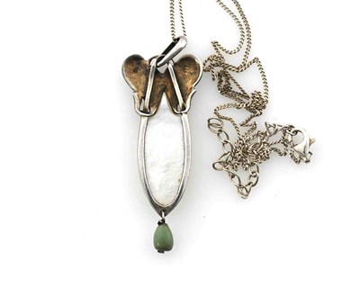 Lot 22 - An Arts & Crafts style silver mother-of-pearl pendant, with chain