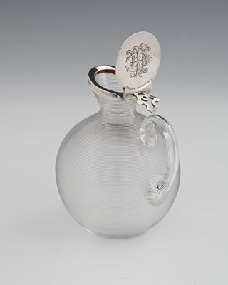 Lot 248 - A Victorian silver-mounted jug, with threaded...