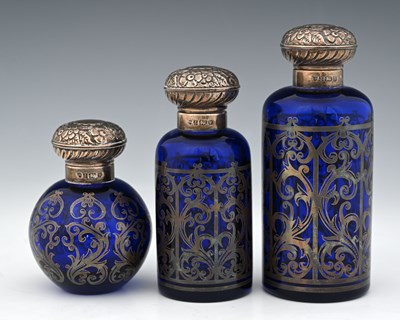 Lot 383 - A graduated suite of three silver-mounted...