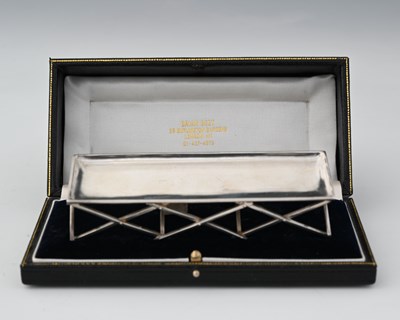 Lot 283 - An Edwardian silver model of a folding...