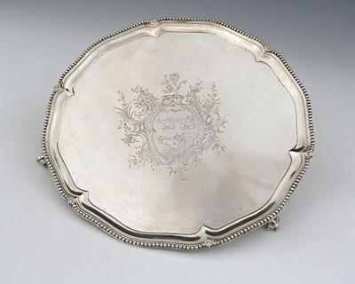 Lot 423 - A George III silver neoclassical salver, with...