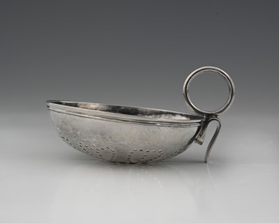 Lot 167 - An eighteenth-century silver strainer, likely...